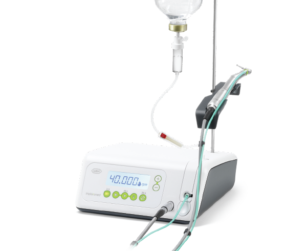 Image of the W&H Implantmed Classic, a high-performance surgical motor system for dental implantology. The unit features a powerful motor with torque of 5.5 Ncm and a speed range of 300 to 40,000 rpm, an easy-to-read auto backlight display, and ergonomic design for fatigue-free operation. Its automatic thread cutter function supports implant placement in hard bone, reducing stress and promoting optimal healing outcomes.